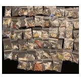 55 pairs of pierced earring in small zipper bags