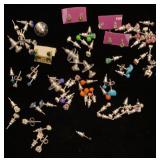 Several pairs of rhinestone stud earrings