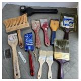 Paint scrapers, used paint brushes