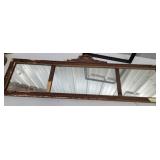 mirror with damage and open frame