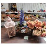 lantern and flowers in pots