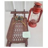 metal sleigh and lantern