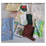 Towels and wash cloths, some with stains