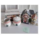 Christmas house with lights, cream & sugar