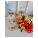 lamp with mismatch shade, empty vase,