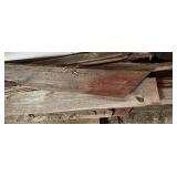 Pile of Red Barn Wooden Boards