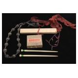 Ribbon necklaces and hair bun sticks