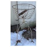 Antique wire basket plant stand