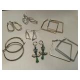 7 pairs of pierced earrings