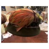 Green velvet vintage hat with feathers, beautiful