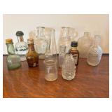 Collection of vintage miniature glass bottles
