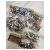 Broken necklaces, beads,