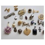 Pendants, cuff links, lion etched face