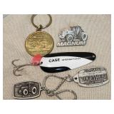 J. I. Case keyrings, hat pin, fishing lure