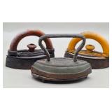 3 Antique Cast Iron Sad Irons w/Trivet