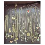 Large miscellaneous box of gold tone jewelry
