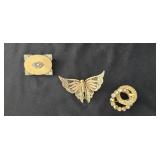 Lot of 3 gold tone vintage costume brooches.
