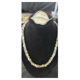 Assorted vintage necklaces and brooches.