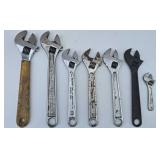 Adjustable wrenches