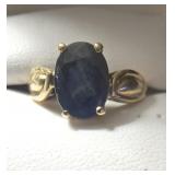14k Gold Ring with Dark Blue Stone.