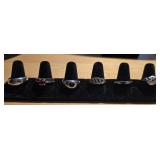 Silver  tone rings (7)