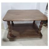 End table with bottom shelf on casters