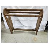 Quilt Rack with heart designs on the end,
