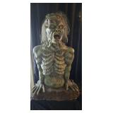 Large Green Zombie Coming Out of Ground