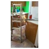 Aluminum ladder, 4 ft level, misc screwdrivers &