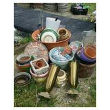 Several clay and ceramic flower pots