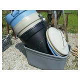 Three trash barrels, one tote