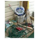 Extension cord, gardening gloves, hammer, box