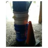 Five gallon buckets, tarp, orange cones.