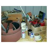 Assortment of tools, sandpaper, safety glasses