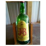 J&B Scotch whiskey 1 gallon bottle on wooden stand