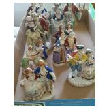 Occupied Japan Colonial man and woman figurines