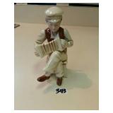 Japan musical figurine marked Mocco