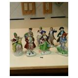 Occupied Japan man and woman figurines measuring