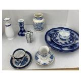 Assorted blue and white vases , plates and more