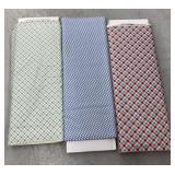 Assorted rolls of fabric