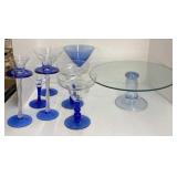 Assorted blue glass kitchenware