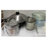 Cooking pan, measuring cups, juice squeezer,