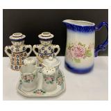 Pitcher, shakers, honey cup, lady and man candle