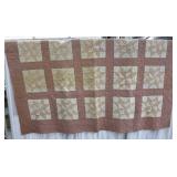 Red and White Pinwheel Quilt