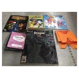 Lot includes pokemon magazine, Warcraft magazine
