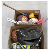 Lot of sports equipment including soccer balls,