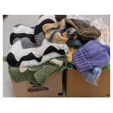 Boxes of Crocheted Blankets and Hats