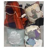 Lot of various bedding and bathroom towels.