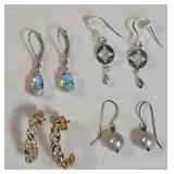 Sterling silver earrings 4 pairs. One pair has