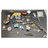 Assorted lot including pins, key chain, magnet